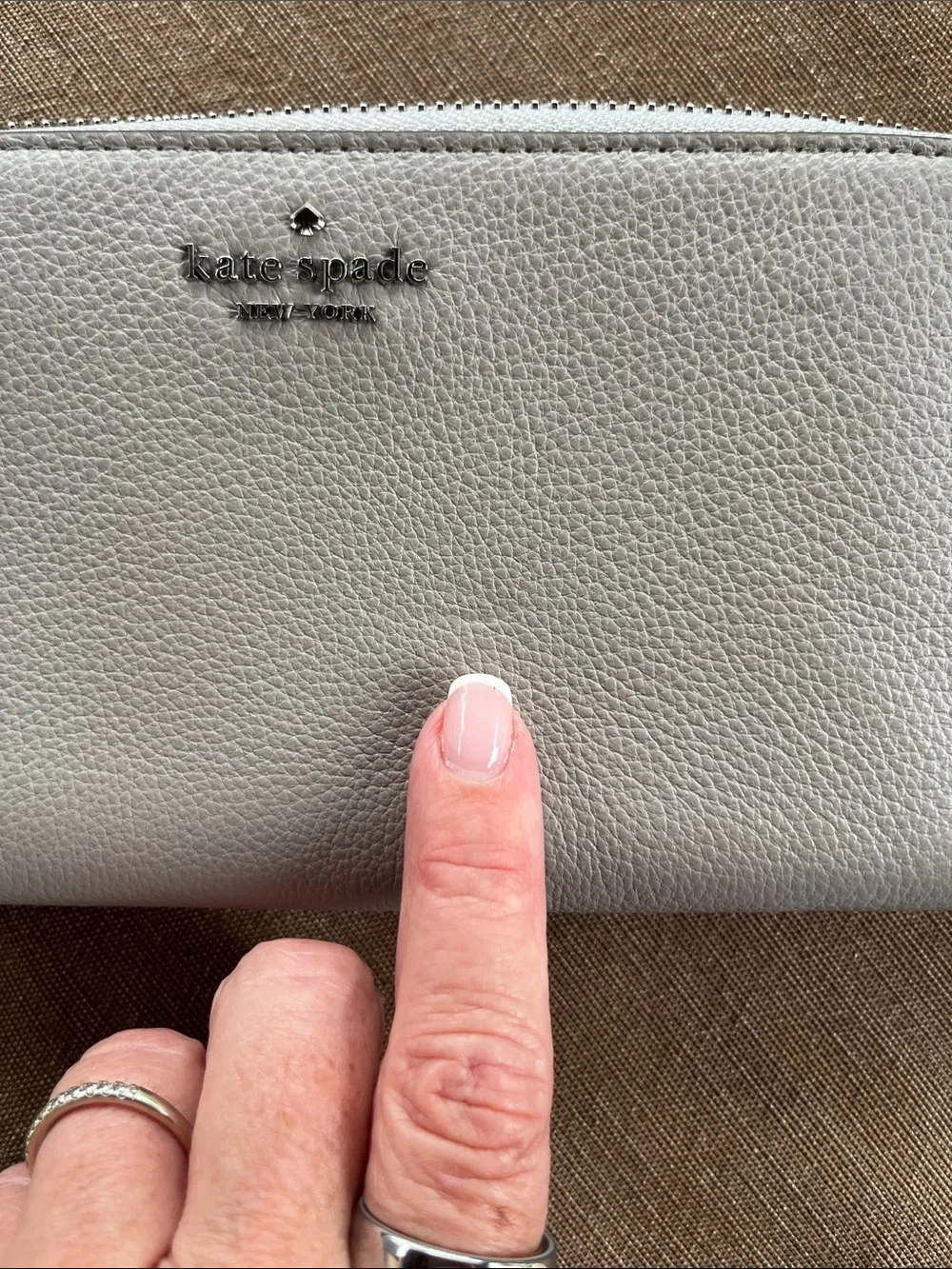 kate spade White Pebbled Leather Zip Wallet